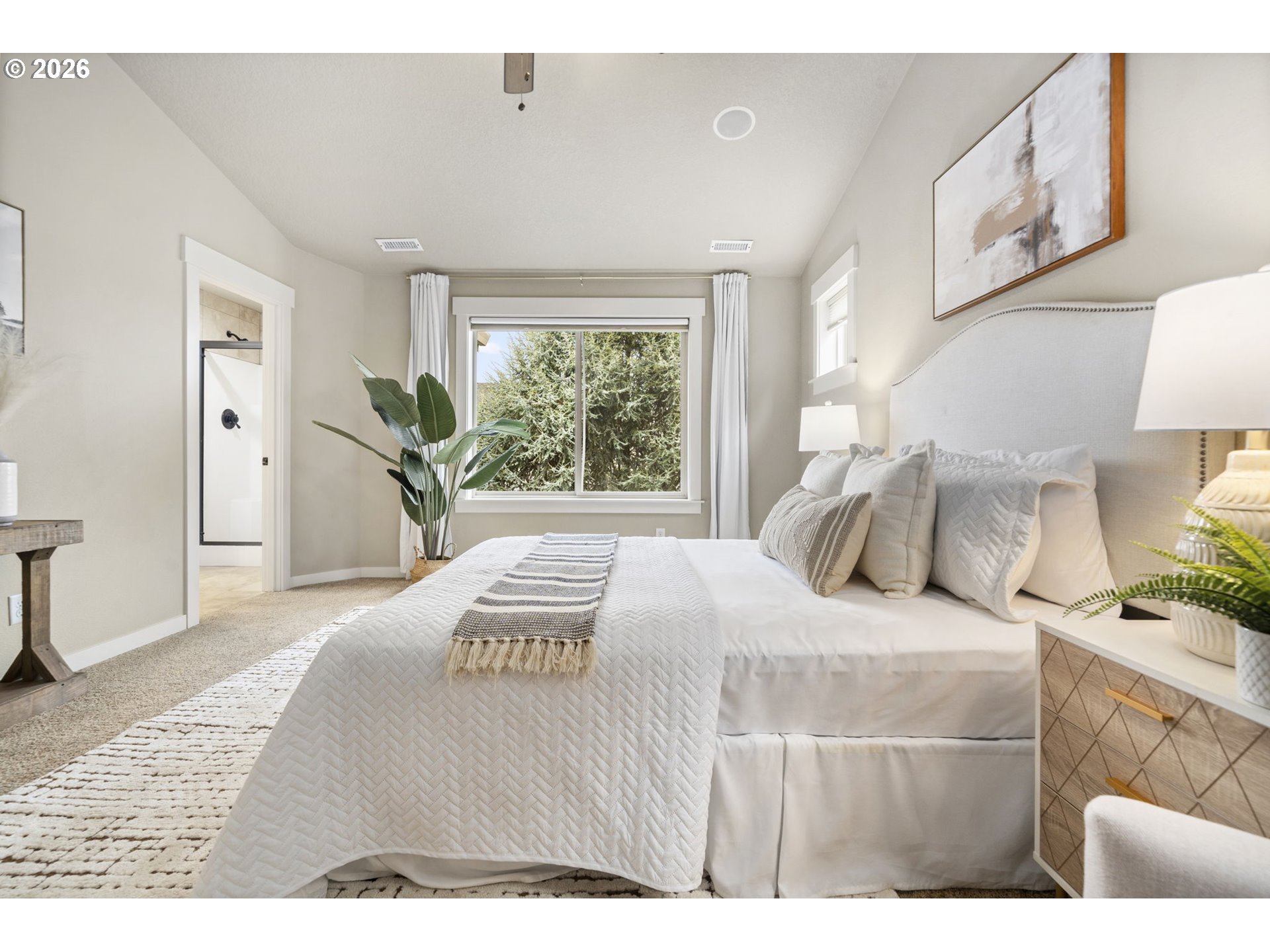 22421 Southwest Sequoia Terrace Sherwood, OR 97140 - Photo 25 of 48 a bedroom with a bed and a large window
