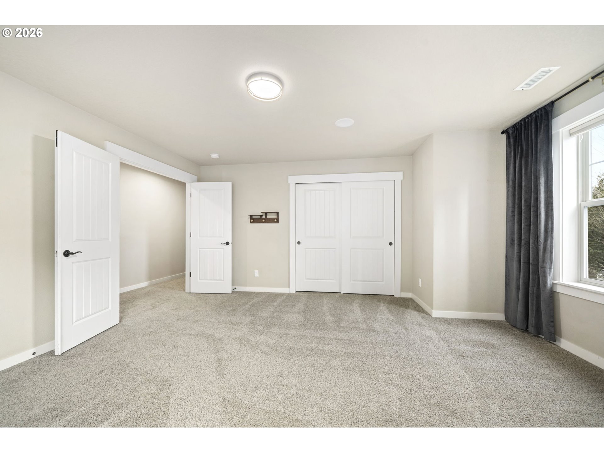 22421 Southwest Sequoia Terrace Sherwood, OR 97140 - Photo 36 of 48 an empty room with windows and closet