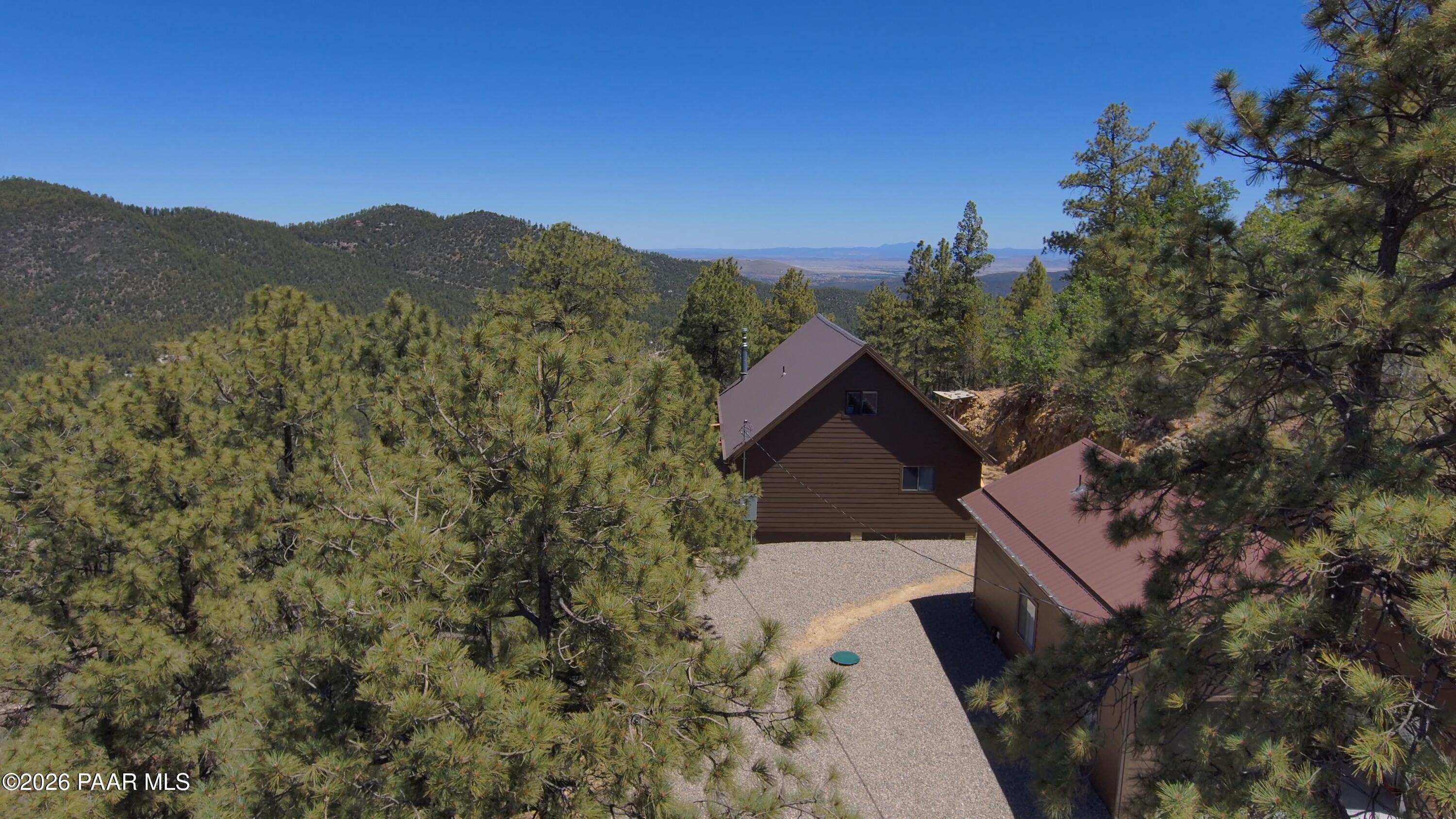 7251 South Big Bug Mesa Road Mayer, AZ 86333 - Photo 7 of 55 a view of a house with a mountain