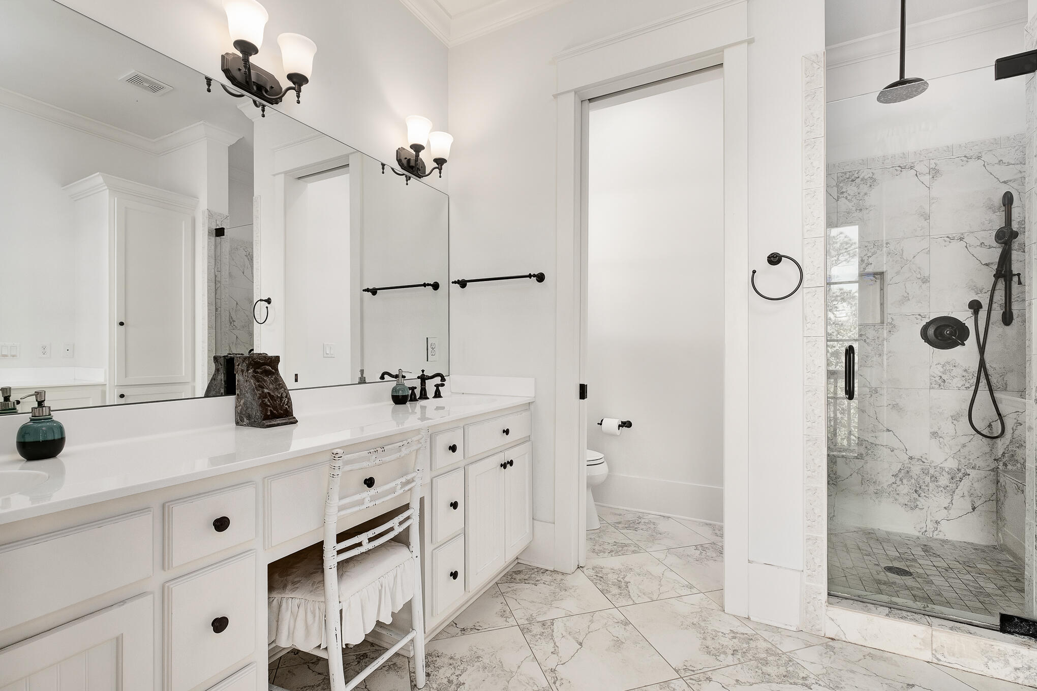273 Grayton Trail Road Santa Rosa Beach, FL 32459 - Photo 28 of 88 a bathroom with a double vanity sink mirror and shower