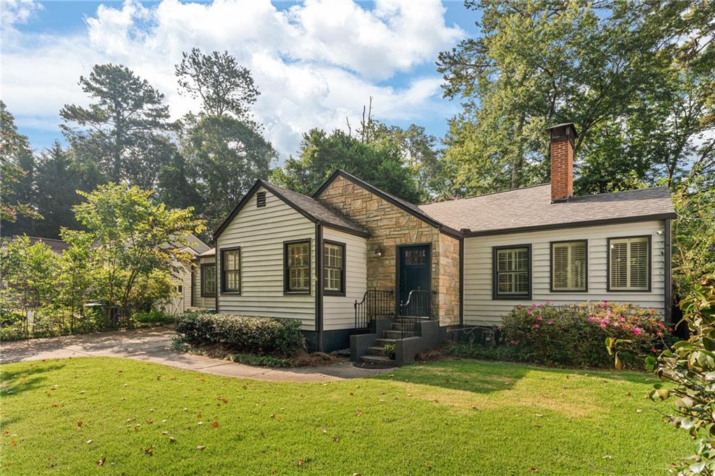1761 Coventry Road Decatur, GA 30030 - Photo 1 of 1 a front view of house with yard and green space