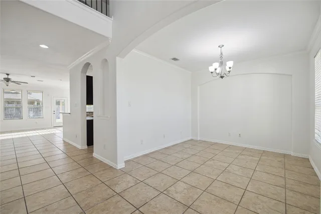 a view of a kitchen with furniture and a kitchen