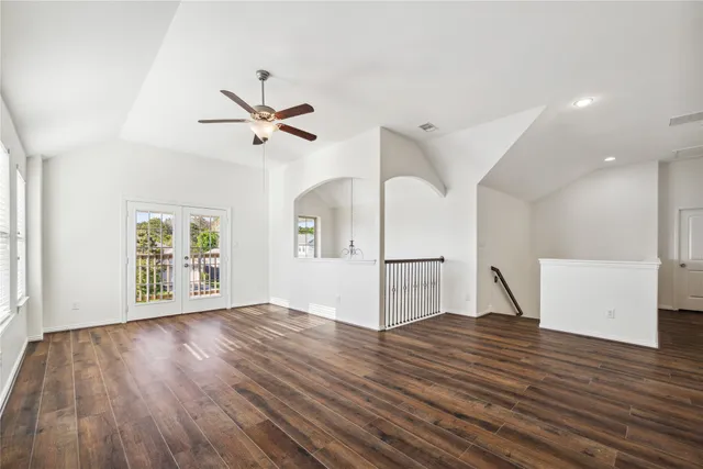 a view of a balcony with wooden floor