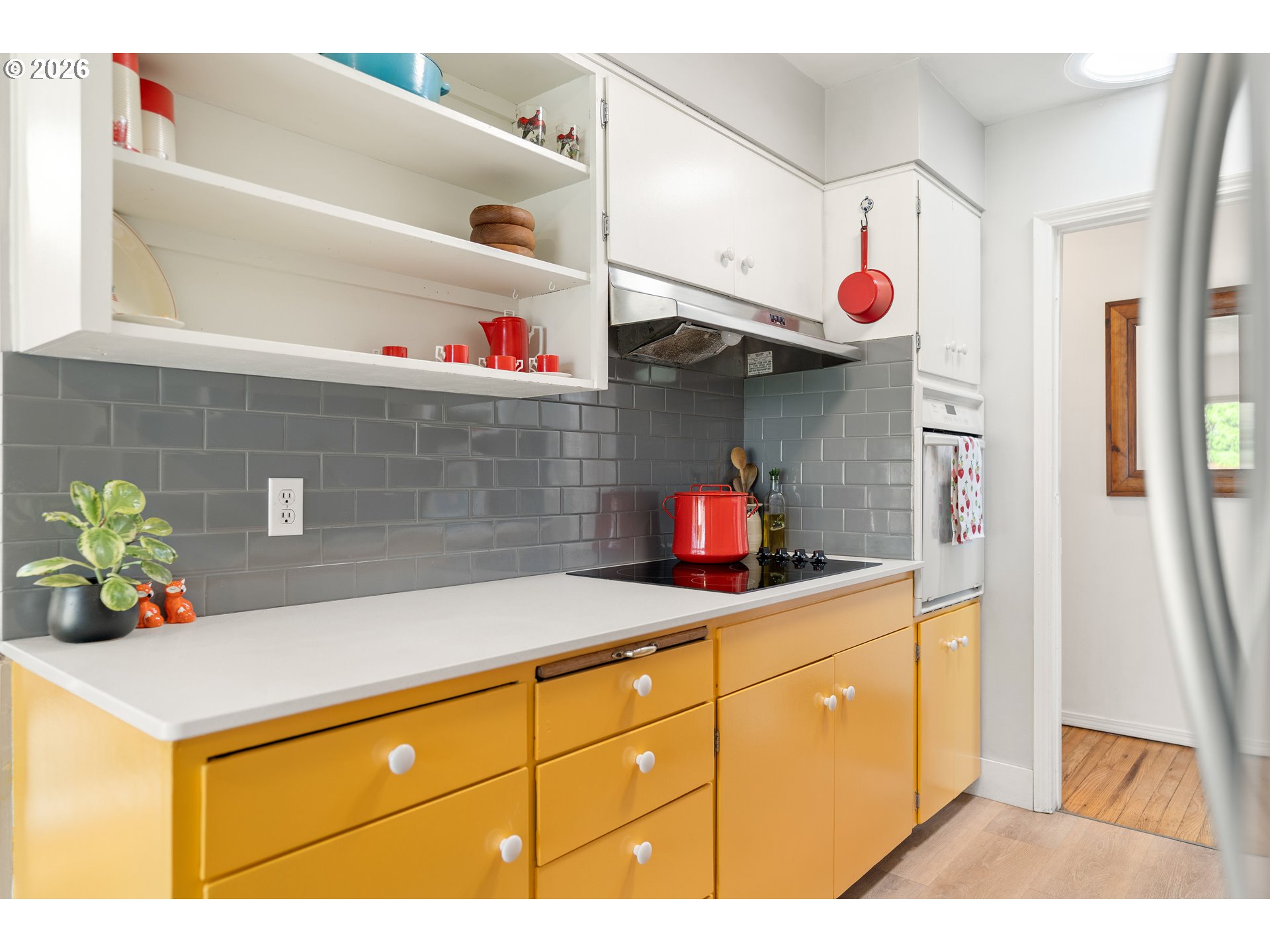 3835 North Alaska Street Portland, OR 97217 - Photo 16 of 43 a kitchen with a sink a stove and cabinets