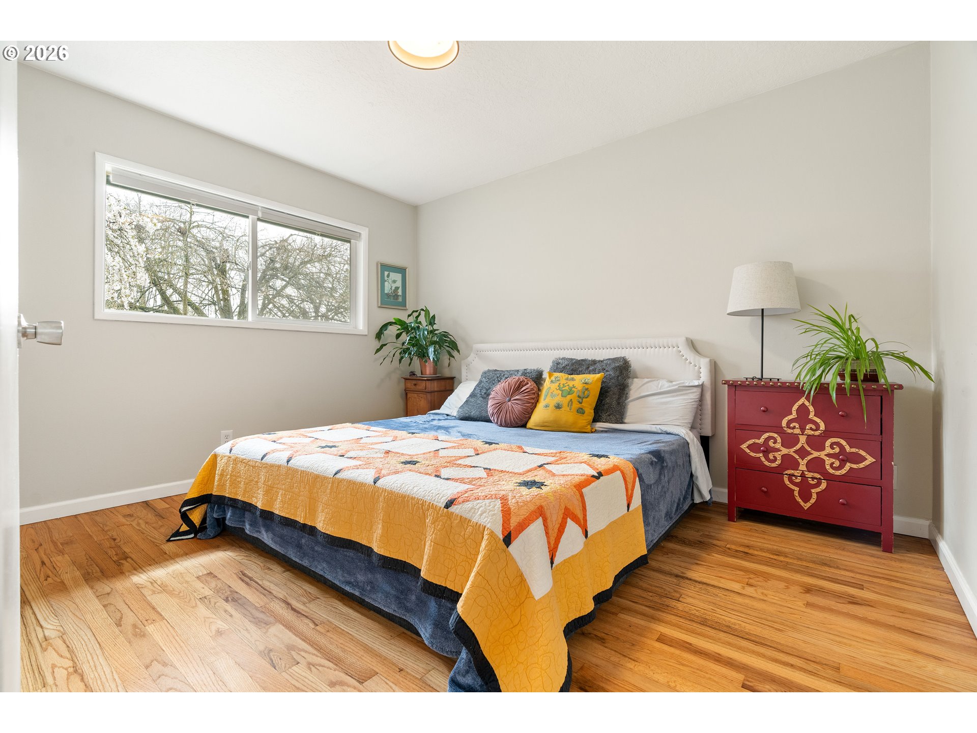 3835 North Alaska Street Portland, OR 97217 - Photo 18 of 43 a bedroom with a bed and window