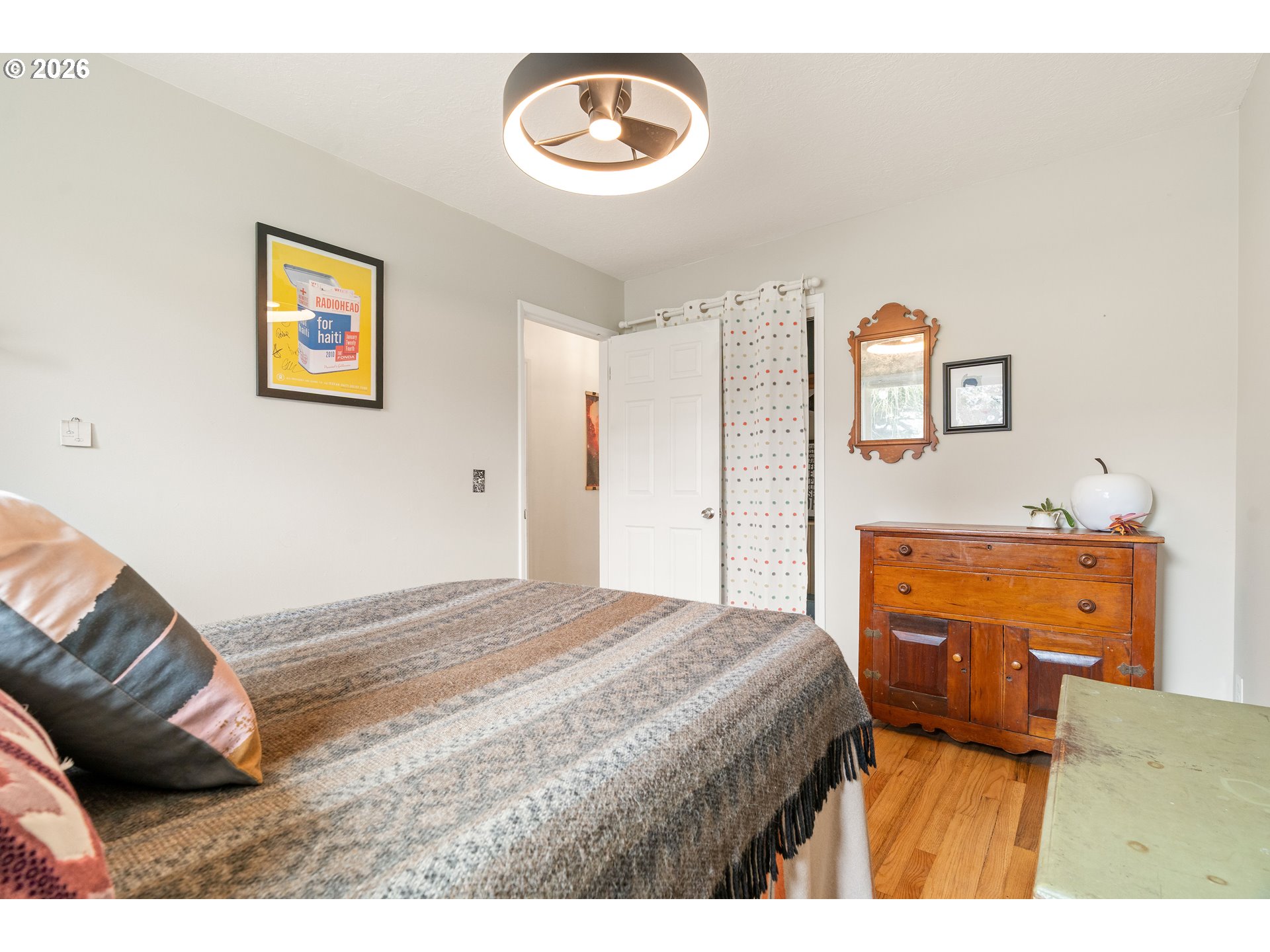 3835 North Alaska Street Portland, OR 97217 - Photo 23 of 43 a bedroom with a bed and a couch