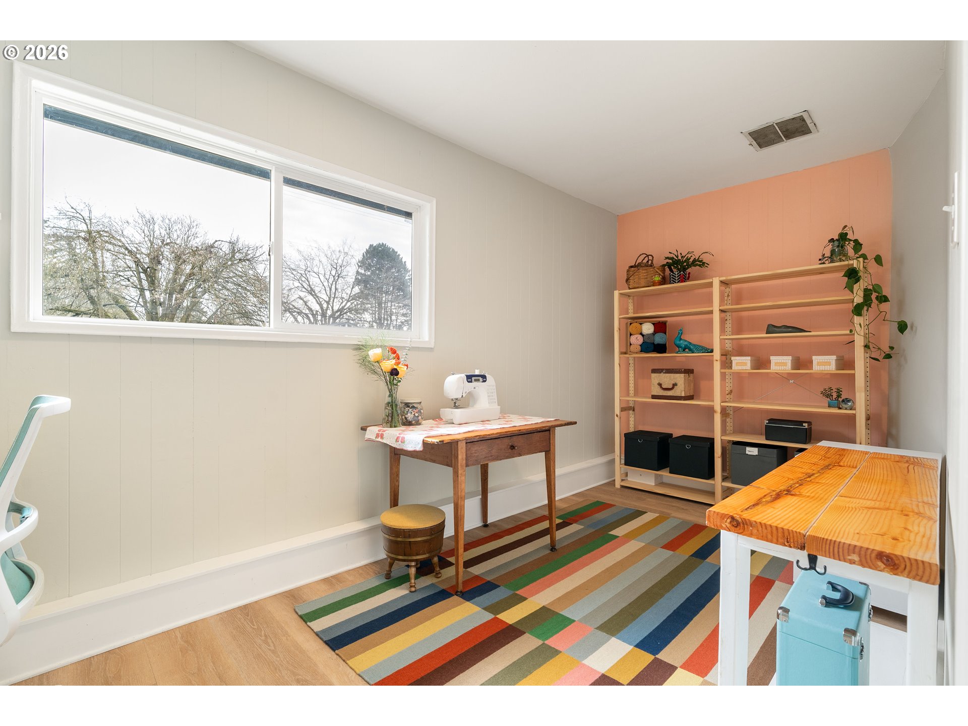 3835 North Alaska Street Portland, OR 97217 - Photo 26 of 43 a living room with furniture a rug and a window