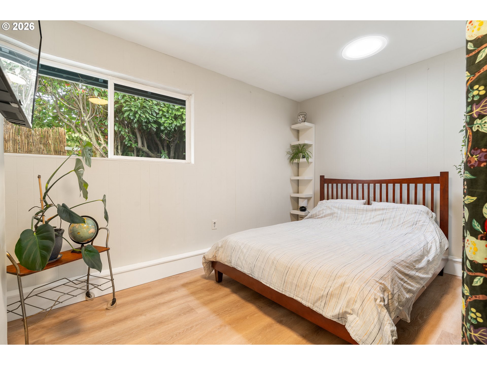 3835 North Alaska Street Portland, OR 97217 - Photo 28 of 43 a bedroom with a bed and a window