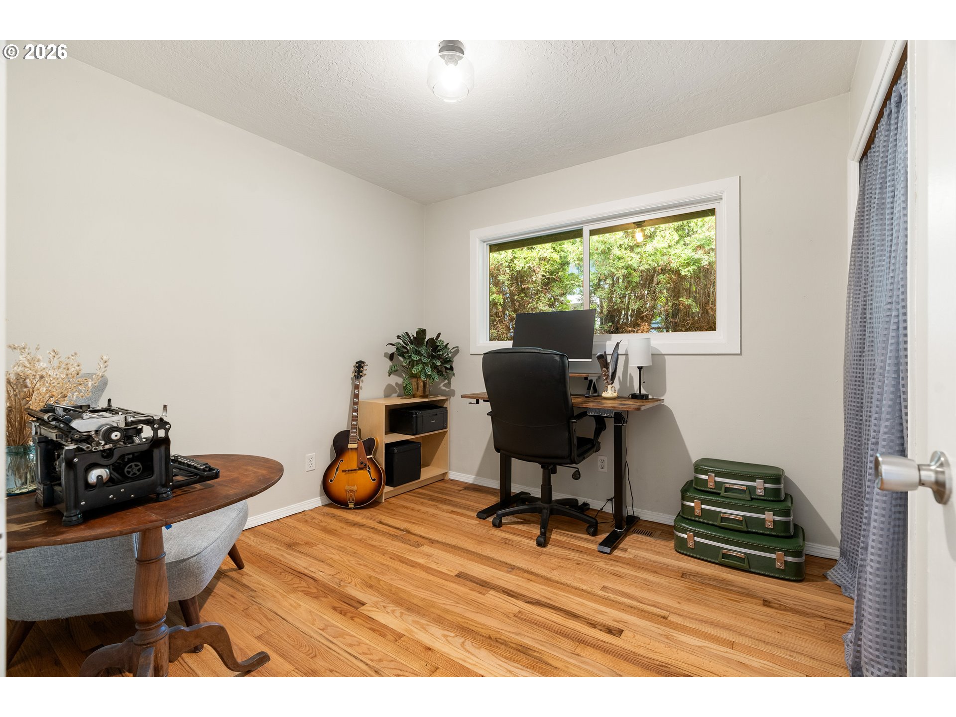 3835 North Alaska Street Portland, OR 97217 - Photo 29 of 43 a room with furniture and a wooden floor