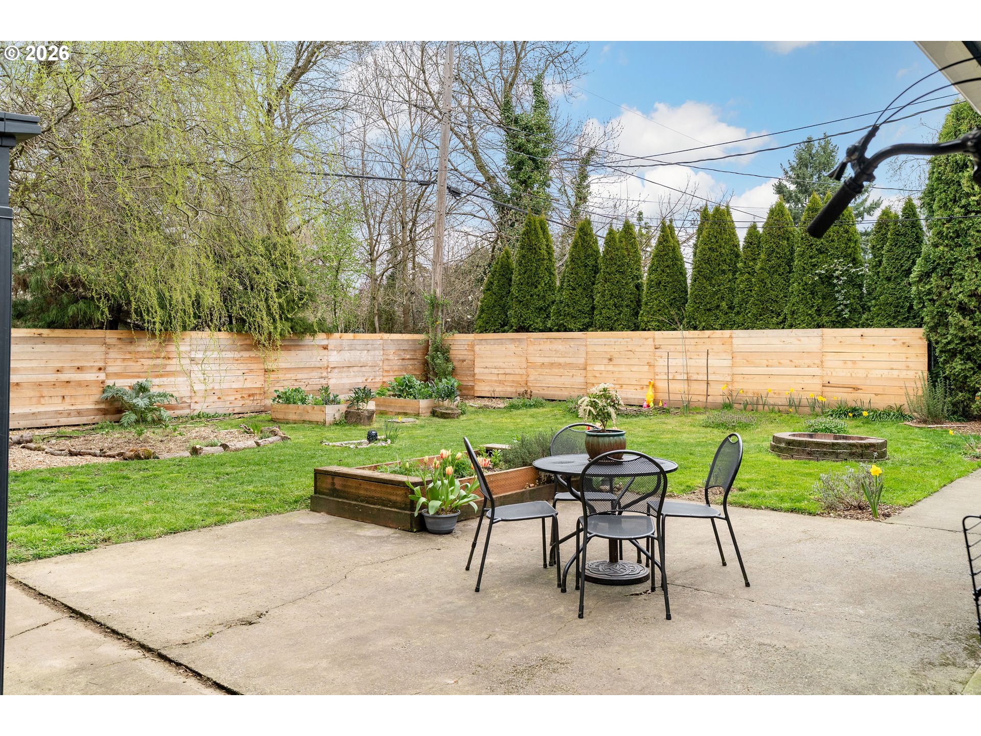 3835 North Alaska Street Portland, OR 97217 - Photo 34 of 43 a view of a table and chairs in the garden