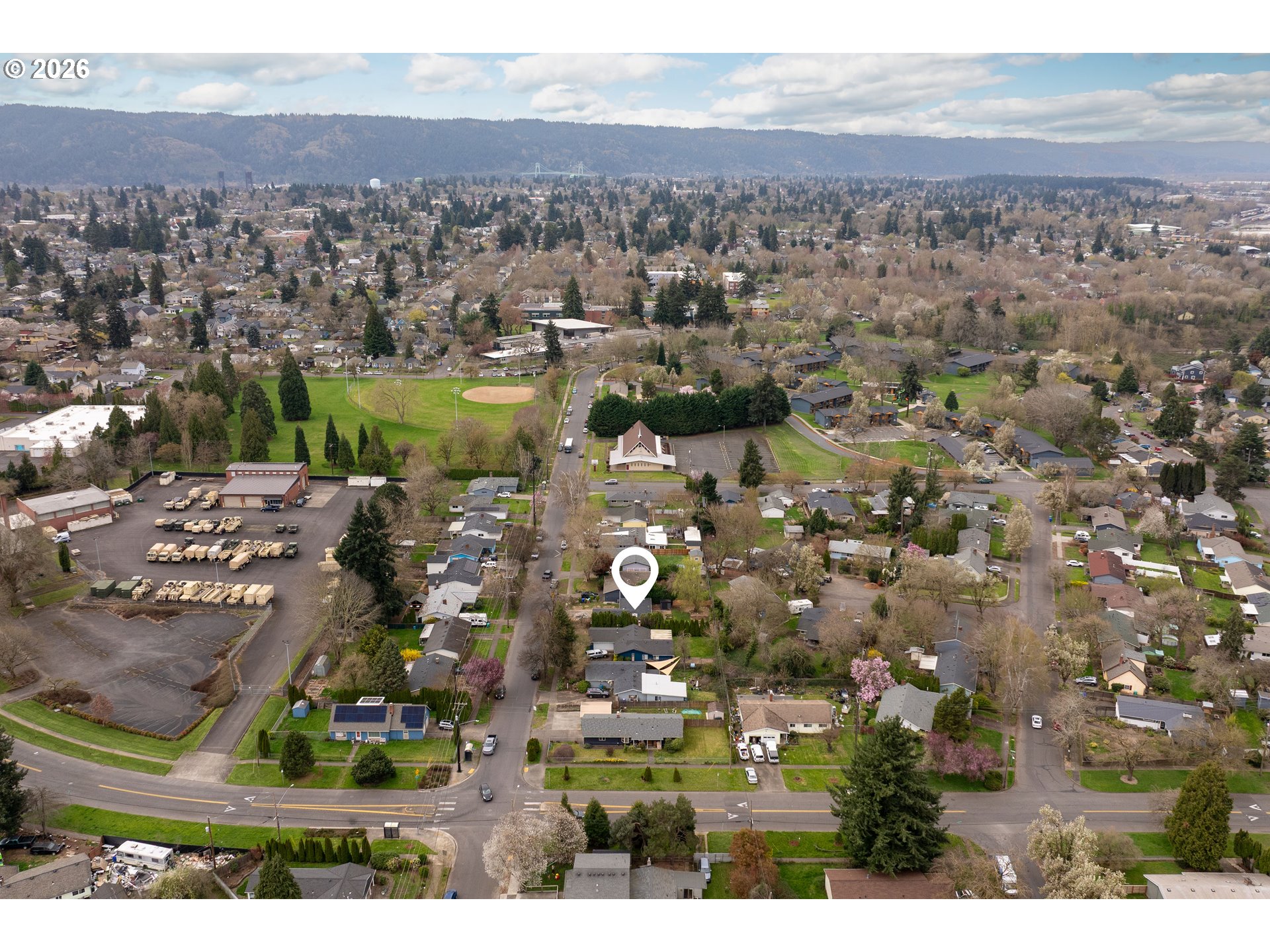 3835 North Alaska Street Portland, OR 97217 - Photo 42 of 43 an aerial view of residential house and lake view