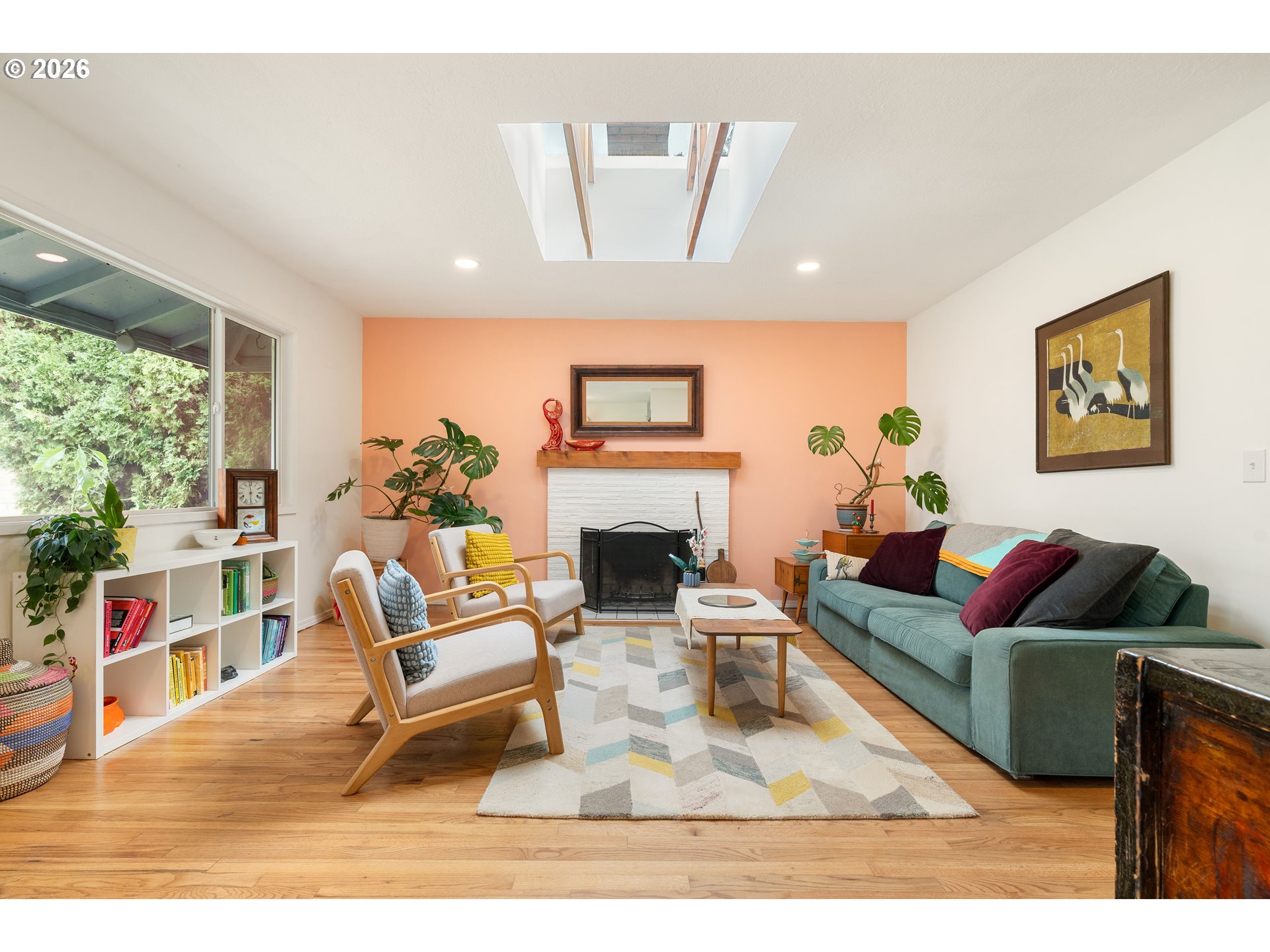 3835 North Alaska Street Portland, OR 97217 - Photo 5 of 43 a living room with furniture a fireplace and a large window