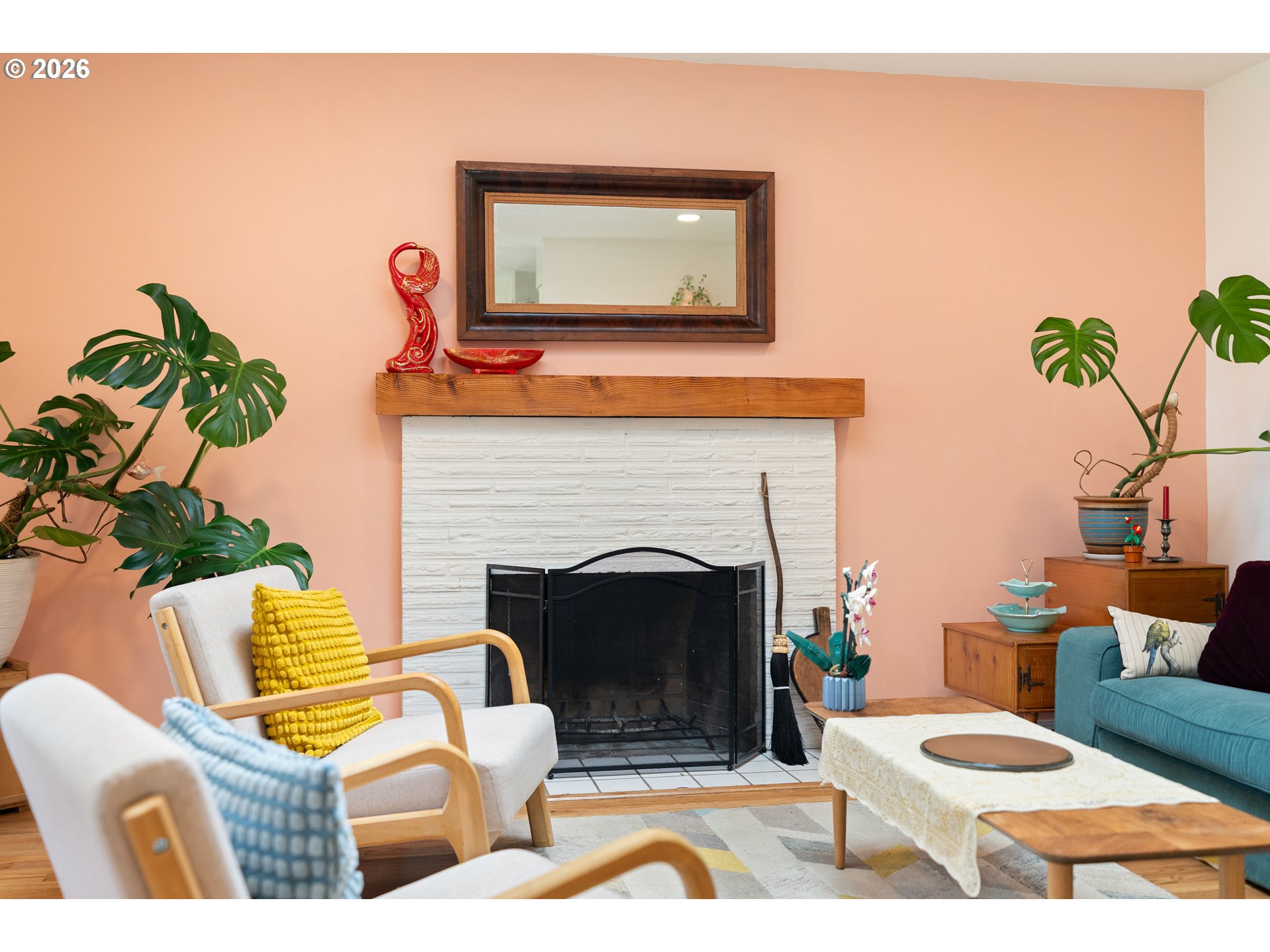 3835 North Alaska Street Portland, OR 97217 - Photo 6 of 43 a living room with furniture and a fireplace