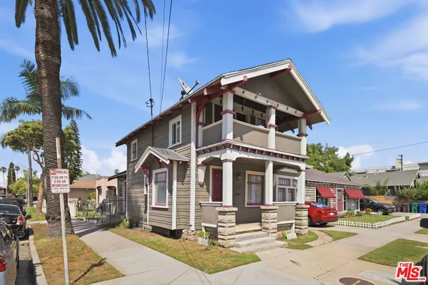 a front view of a building with street view