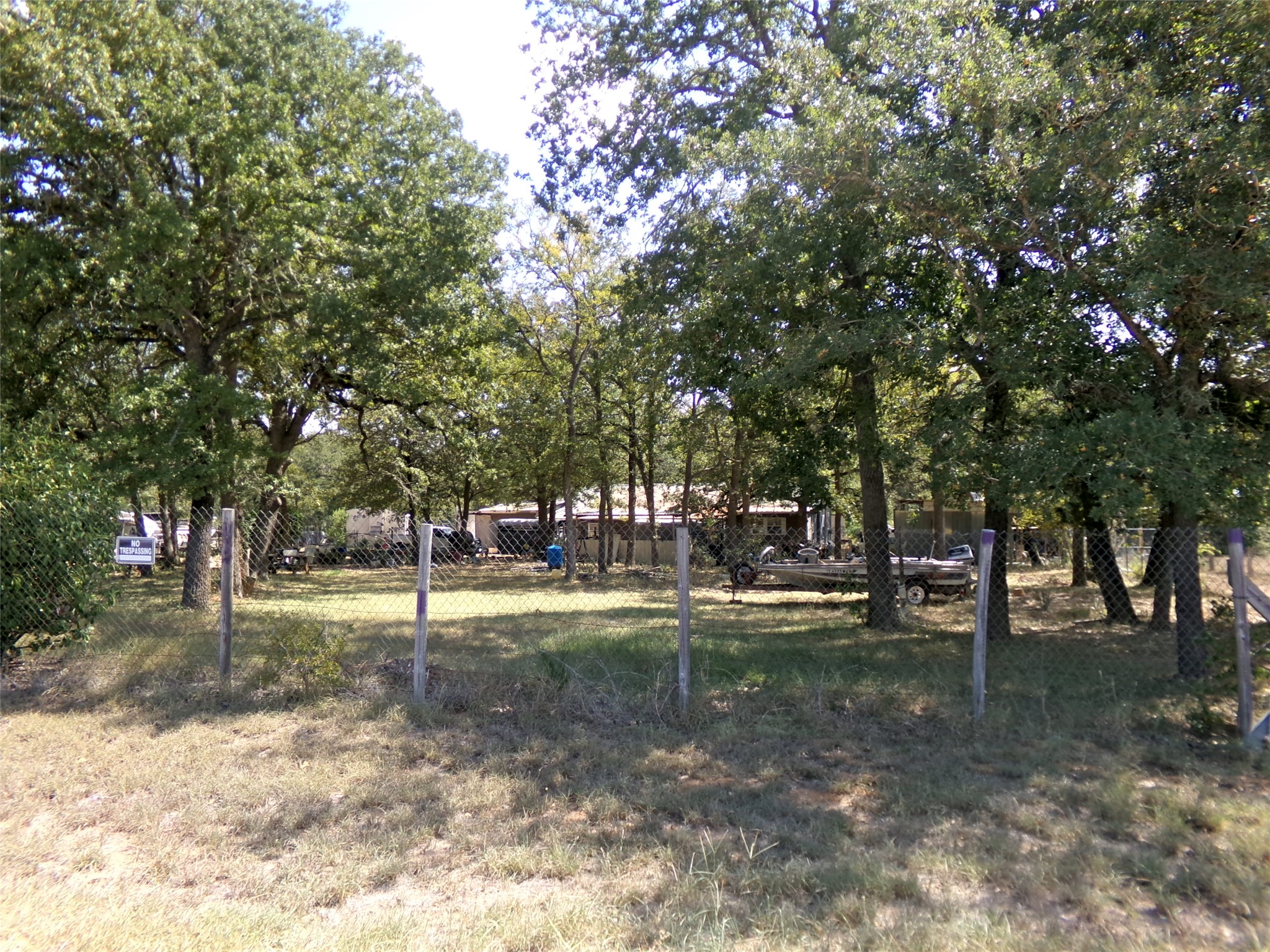 386 Hidden Oaks Drive Elgin, TX 78621 - Photo 2 of 5 a view of a yard with tree s