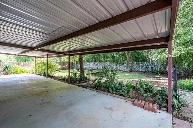 a view of a backyard with garden