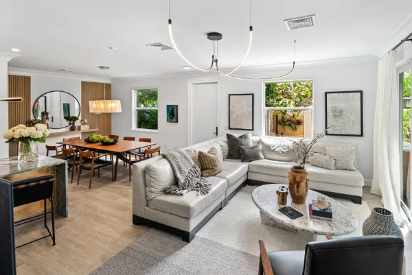 a bedroom with a large bed and a large window