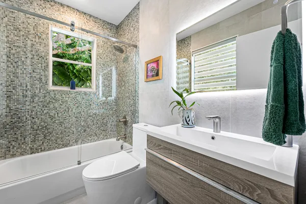 a backyard of a house with lots of green space