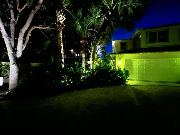 a view of a chairs and table in the patio