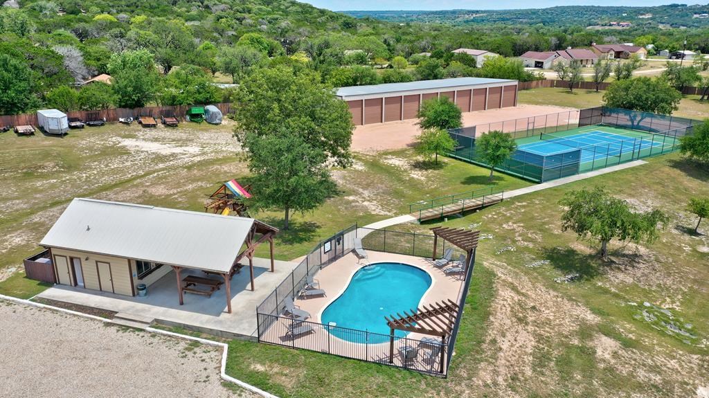 128 Cranbrook Court Ingram, TX 78025 - Photo 11 of 19 an aerial view of a house with a yard and lake view