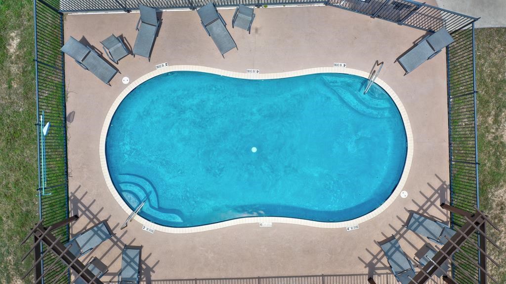 128 Cranbrook Court Ingram, TX 78025 - Photo 12 of 19 an aerial view of a swimming pool
