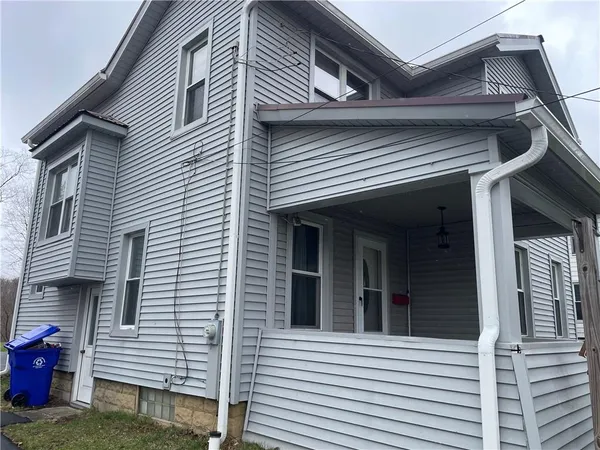 a view of a house with a garage