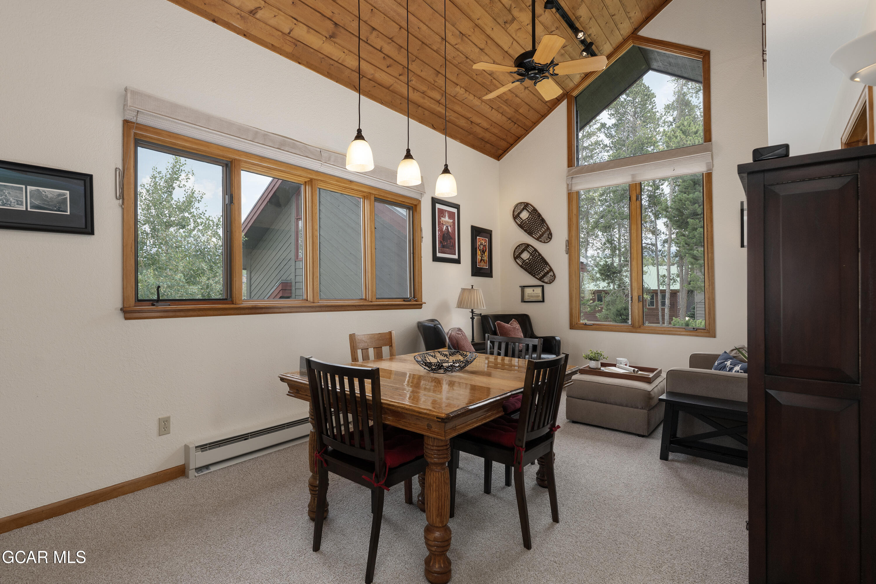 820 Wolverine Lane, Unit 3 Fraser, CO 80442 - Photo 5 of 43 a dining room with furniture and window