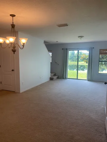 a view of empty room with a empty room