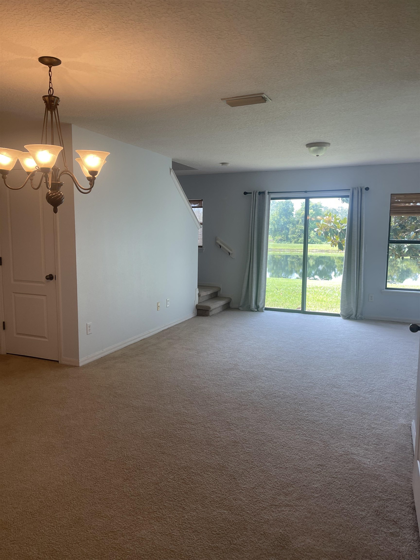 441 Cabernet Place St. Augustine, FL 32084 - Photo 6 of 16 a view of an empty room with a window