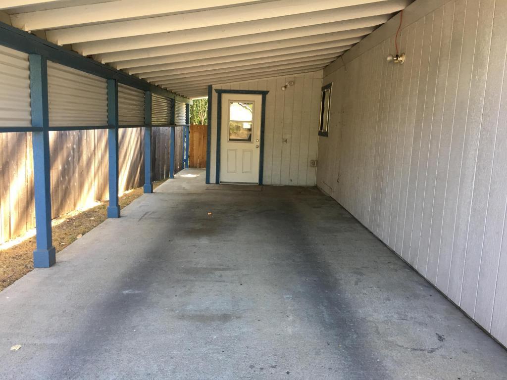 2801 Henderson Road Redding, CA 96002 - Photo 3 of 26 a view of a hallway with windows