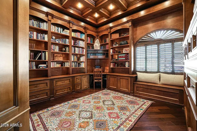 a bedroom with furniture and a window