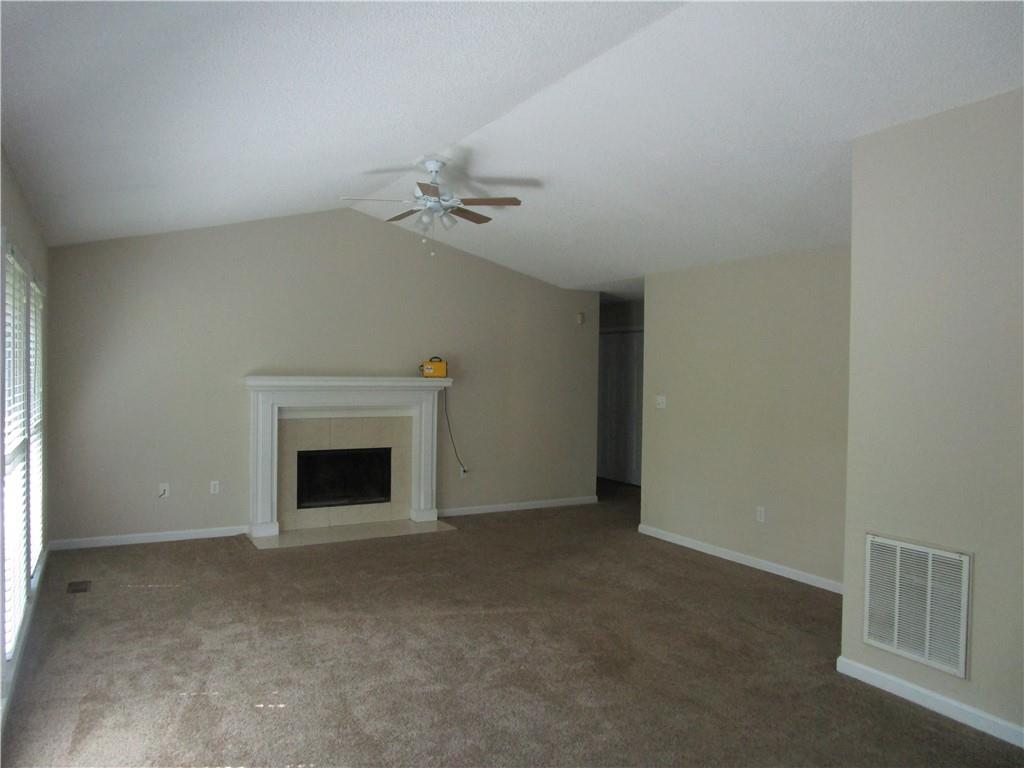 2429 Thompson Mill Road Gainesville, GA 30506 - Photo 15 of 52 a view of empty room with a fireplace