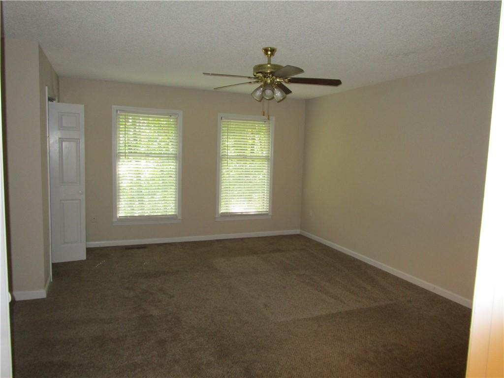 2429 Thompson Mill Road Gainesville, GA 30506 - Photo 18 of 52 a view of an empty room with a window