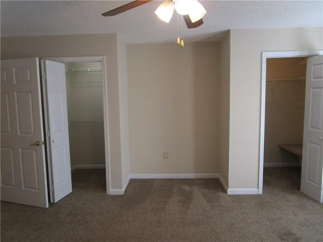 a bathroom with a bathtub and a toilet