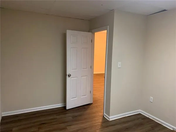 a bathroom with a bathtub and a toilet