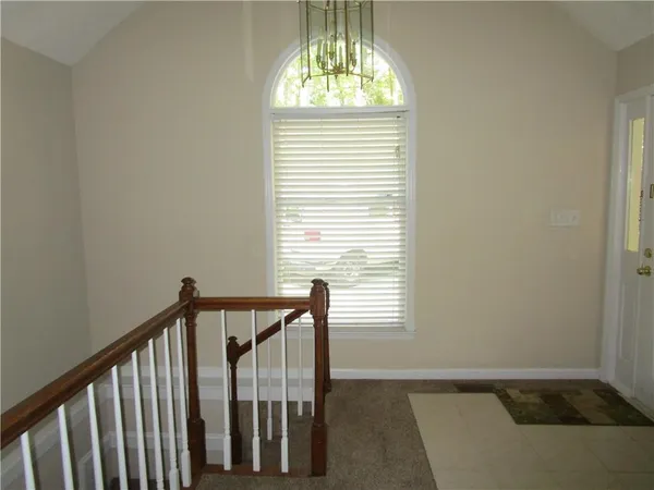 a kitchen with a stove and a microwave