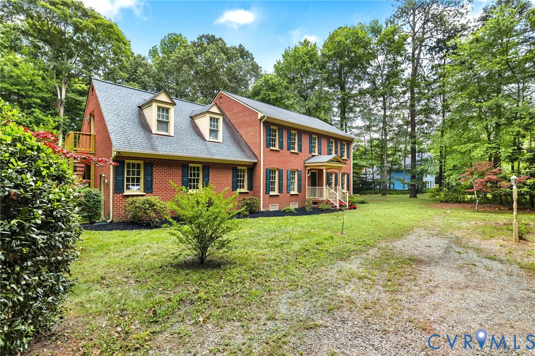 2615 Salisbury Road Midlothian, VA 23113 - Photo 33 of 36 a front view of a house with a yard