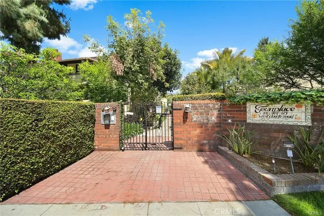a view of a pathway with a building in the background