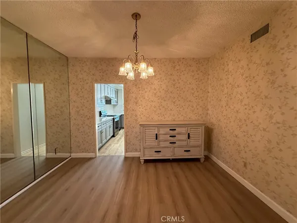 a view of a hallway view with staircase