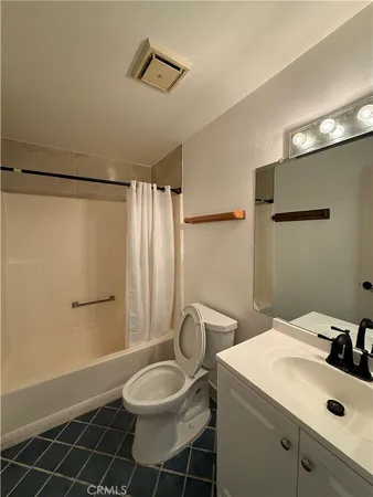 a view of storage and utility room with washer and dryer