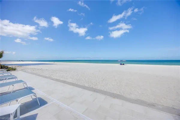 a view of an ocean with a terrace