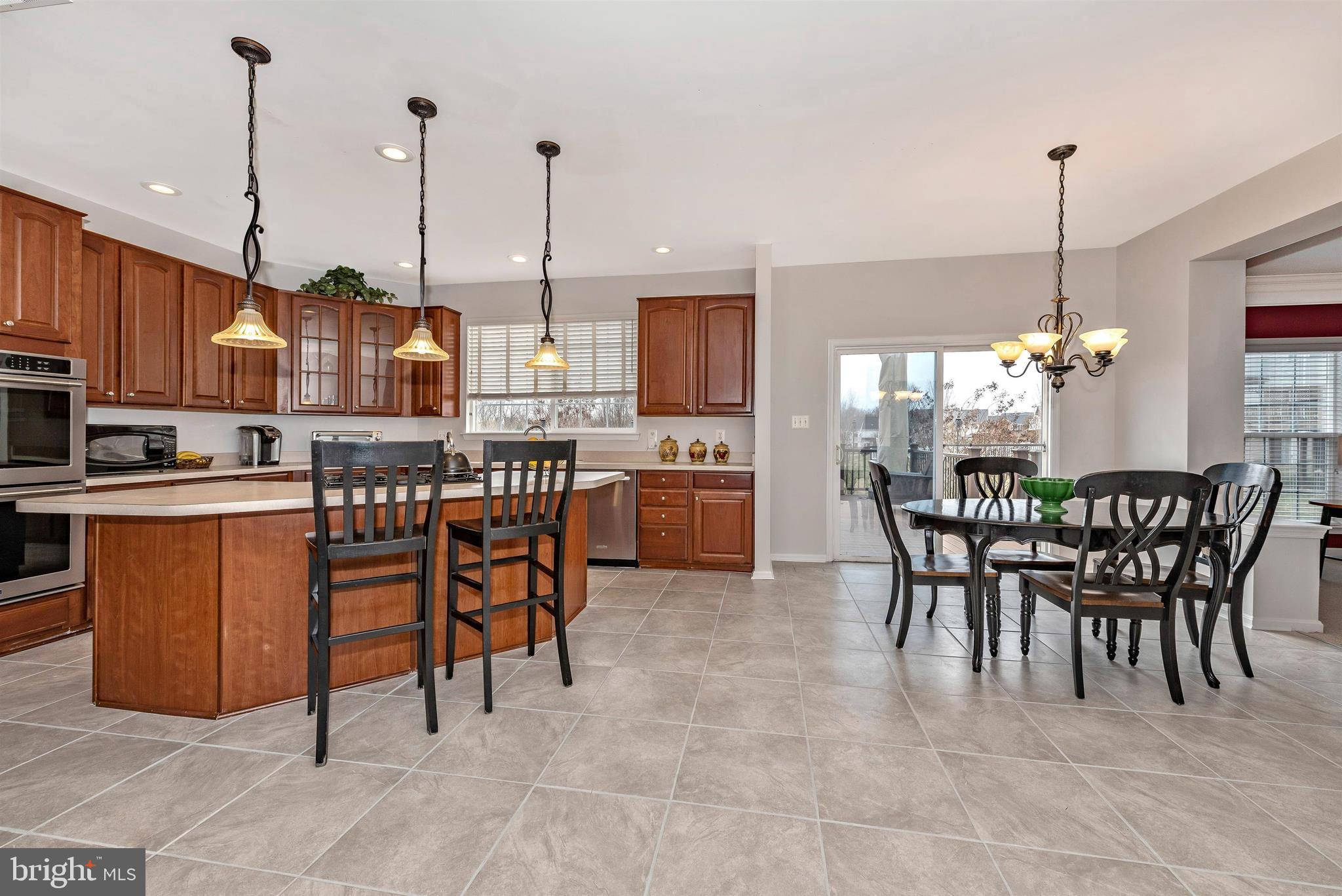 18304 Cornflower Road Boyds, MD 20841 - Photo 16 of 49 Large kitchen with huge island and new tile