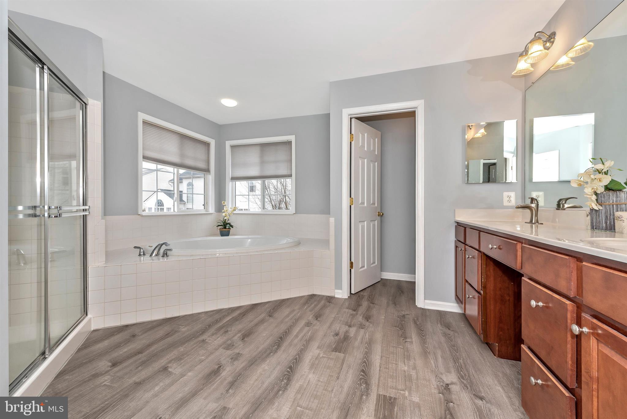 18304 Cornflower Road Boyds, MD 20841 - Photo 34 of 49 New flooring in the master bathroom
