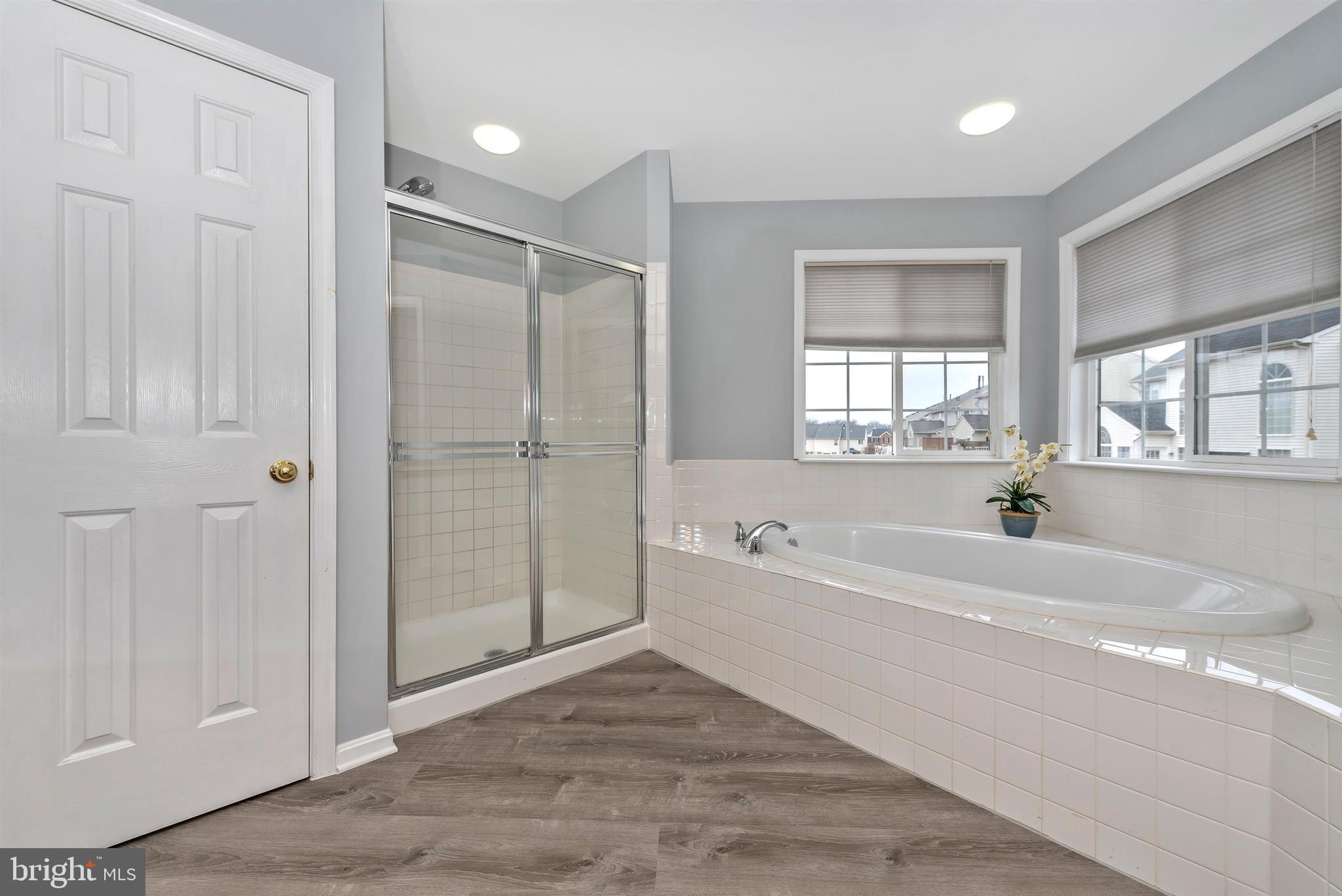 18304 Cornflower Road Boyds, MD 20841 - Photo 36 of 49 Soaking tub and large shower