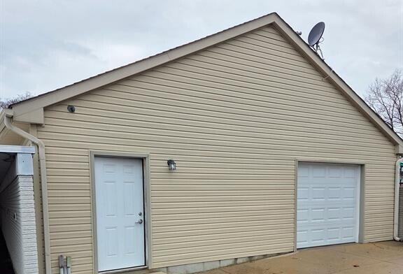 1512 Normandy Road, Unit 105 Clawson, MI 48017 - Photo 33 of 35 garage storage behind carport