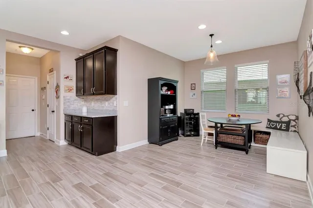 a view of swimming pool with a patio