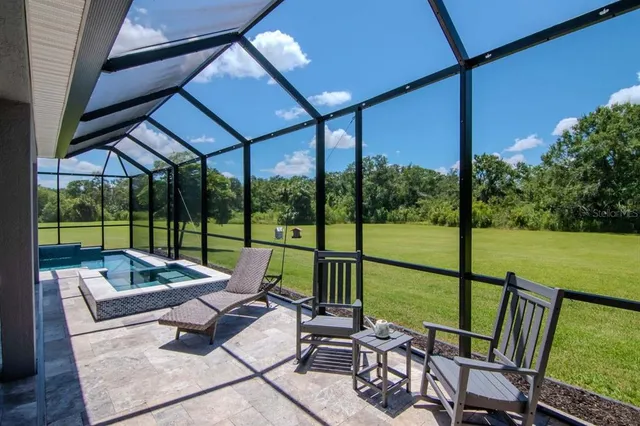 a bedroom with a bed dresser and a window