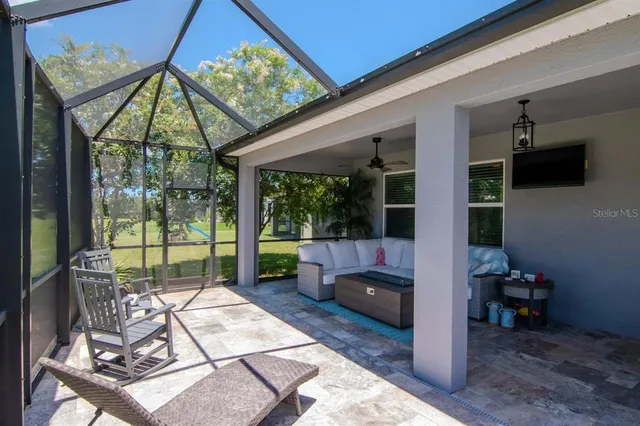 a bathroom with a sink mirror and toilet