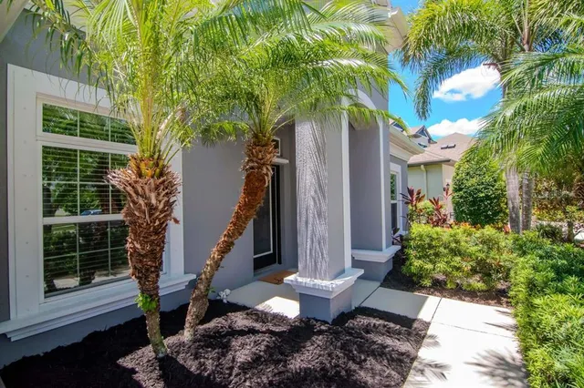 an aerial view of a house with a garden