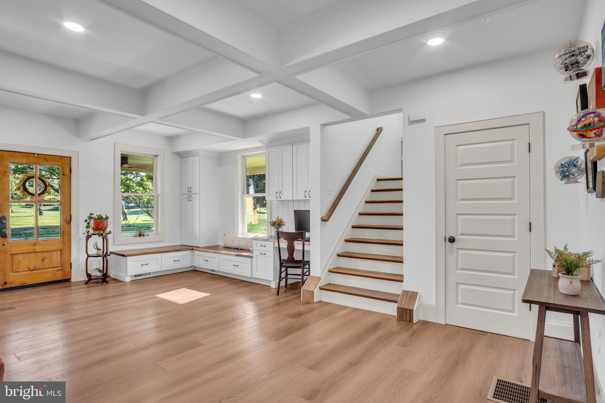 Living room w/ corner built-ins
